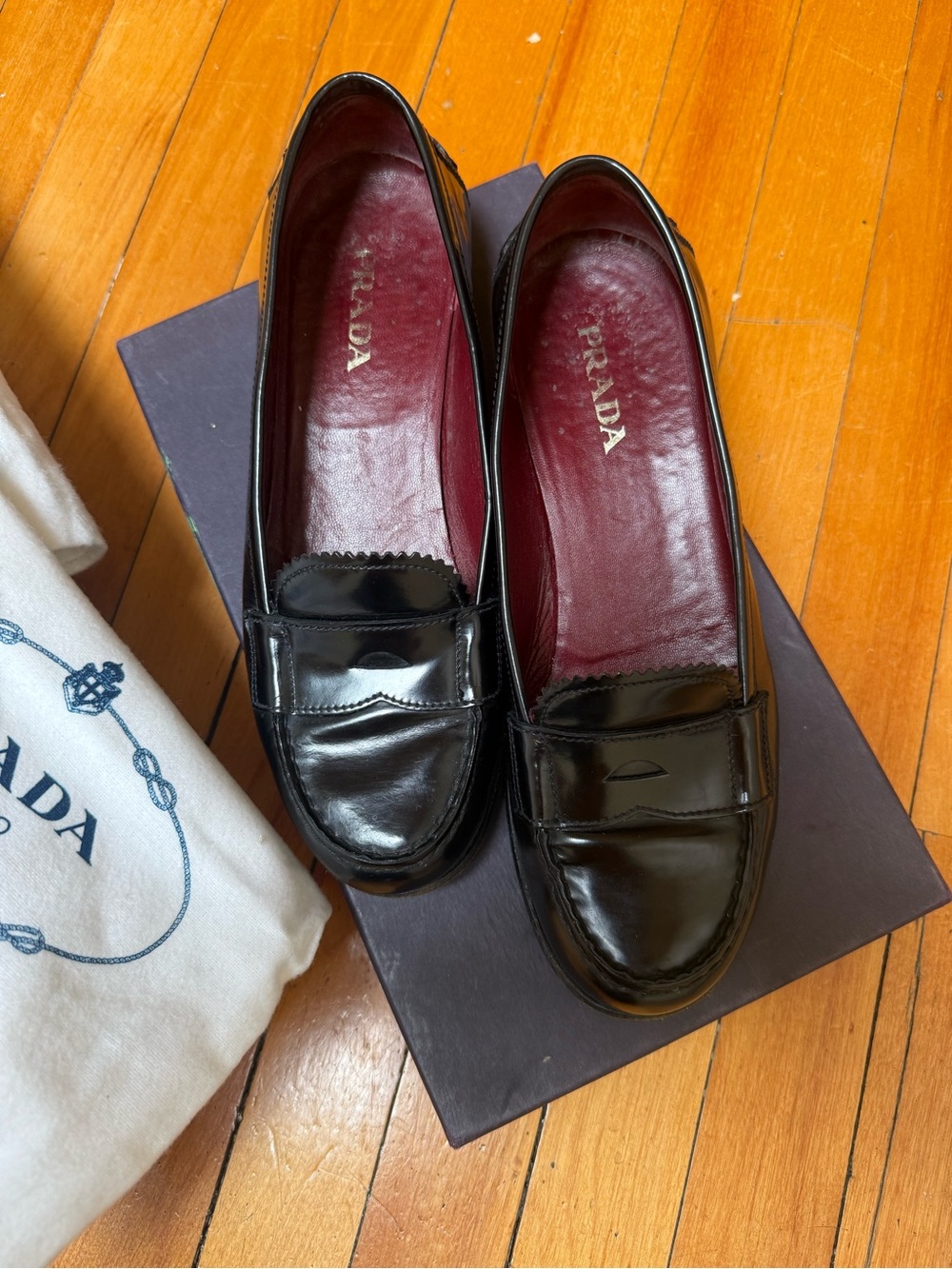 Prada Black Patent Leather Women’s Penny Loafers with Burgundy Insole